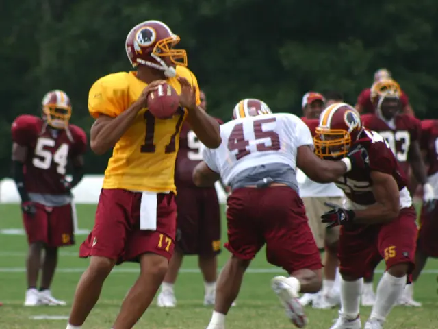 NFL player Shedeur Sanders, son of football legend Deion Sanders, faces challenges in his...